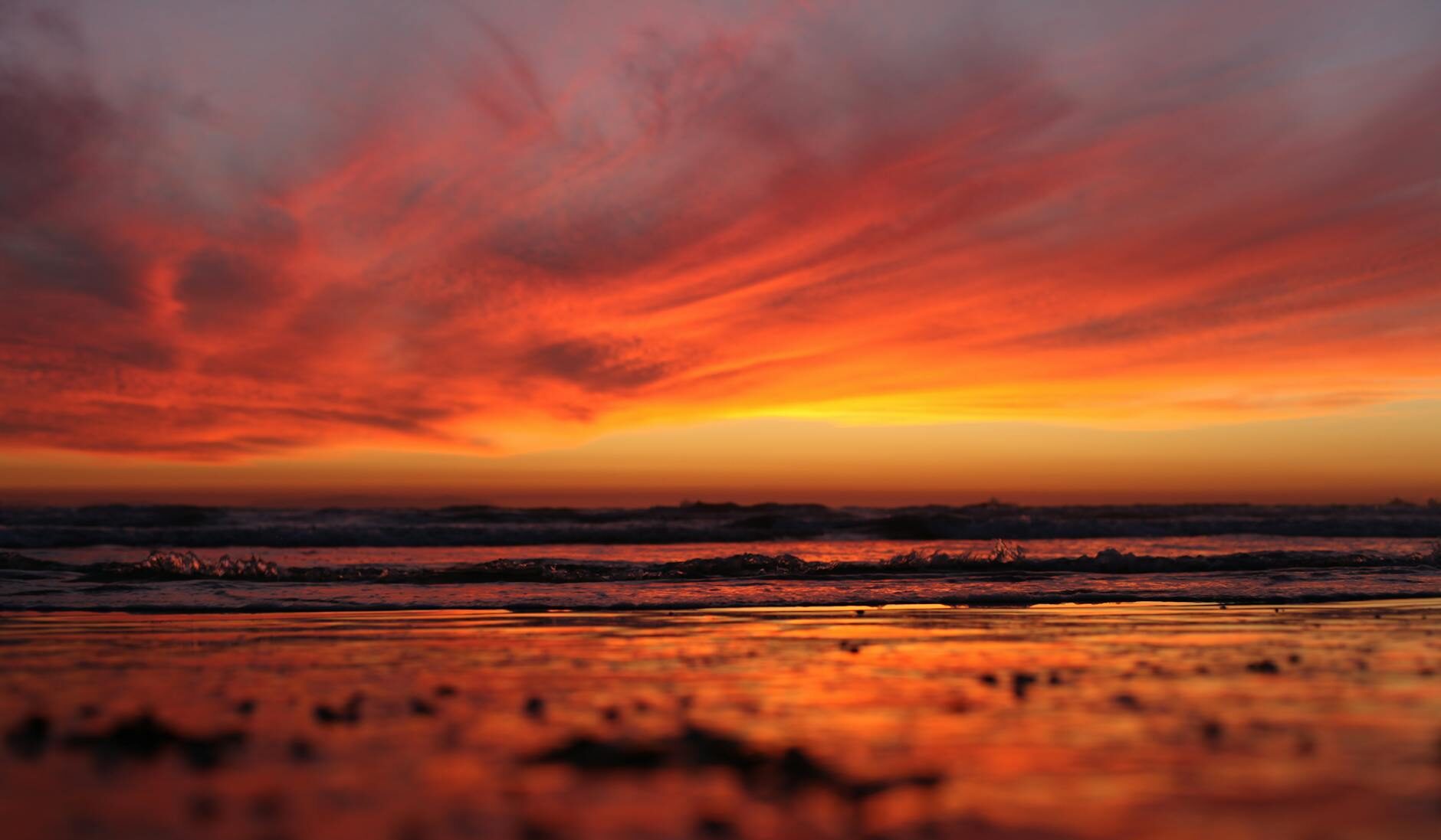 body of water during sunset